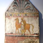 paestum musee-fresque-trouver-sur le site cavalier à pied avec son cheval